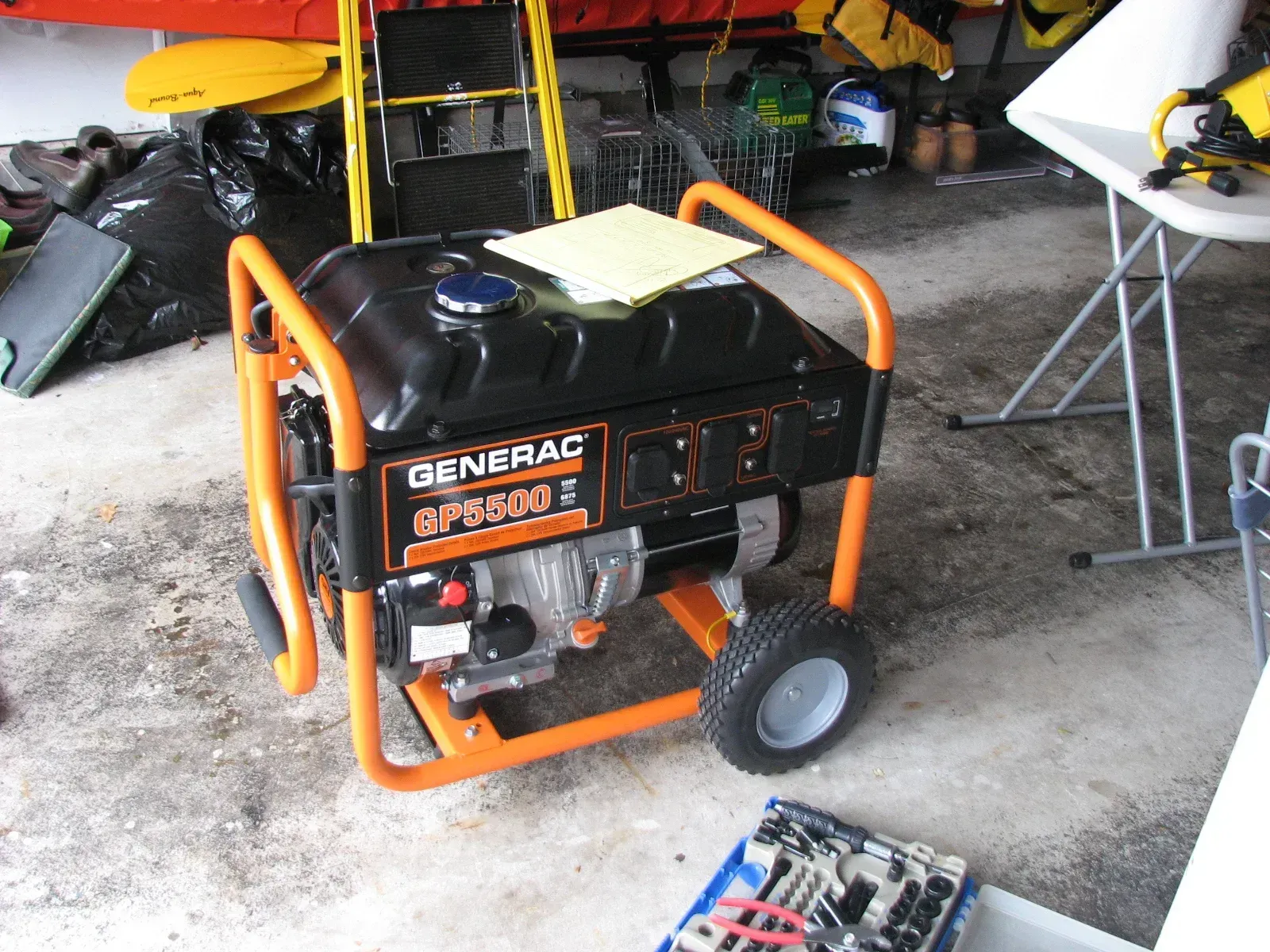 Generac GP5500 portable generator stored in a garage